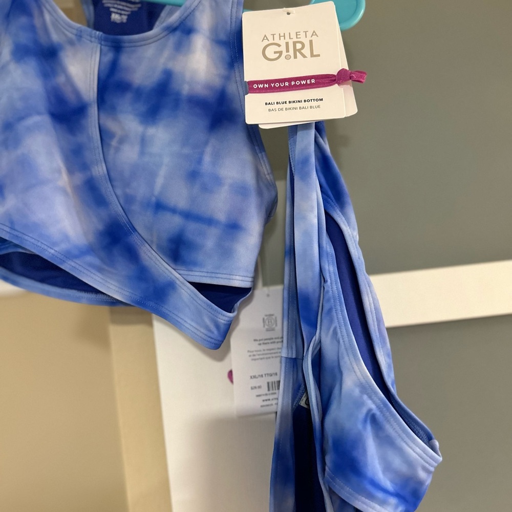 Athletha girls brand. NWT- Shorts, bathing suit, jumper. Didn’t fit. Blue/purple